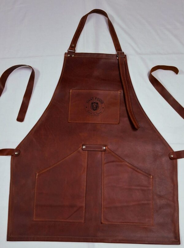 Tobacco coloured leather apron. Standard size. Product of that food.